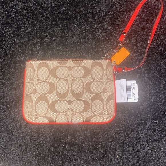 NWT coach park signature wristlet. Khaki/ bright vermillion red - Picture 2 of 6